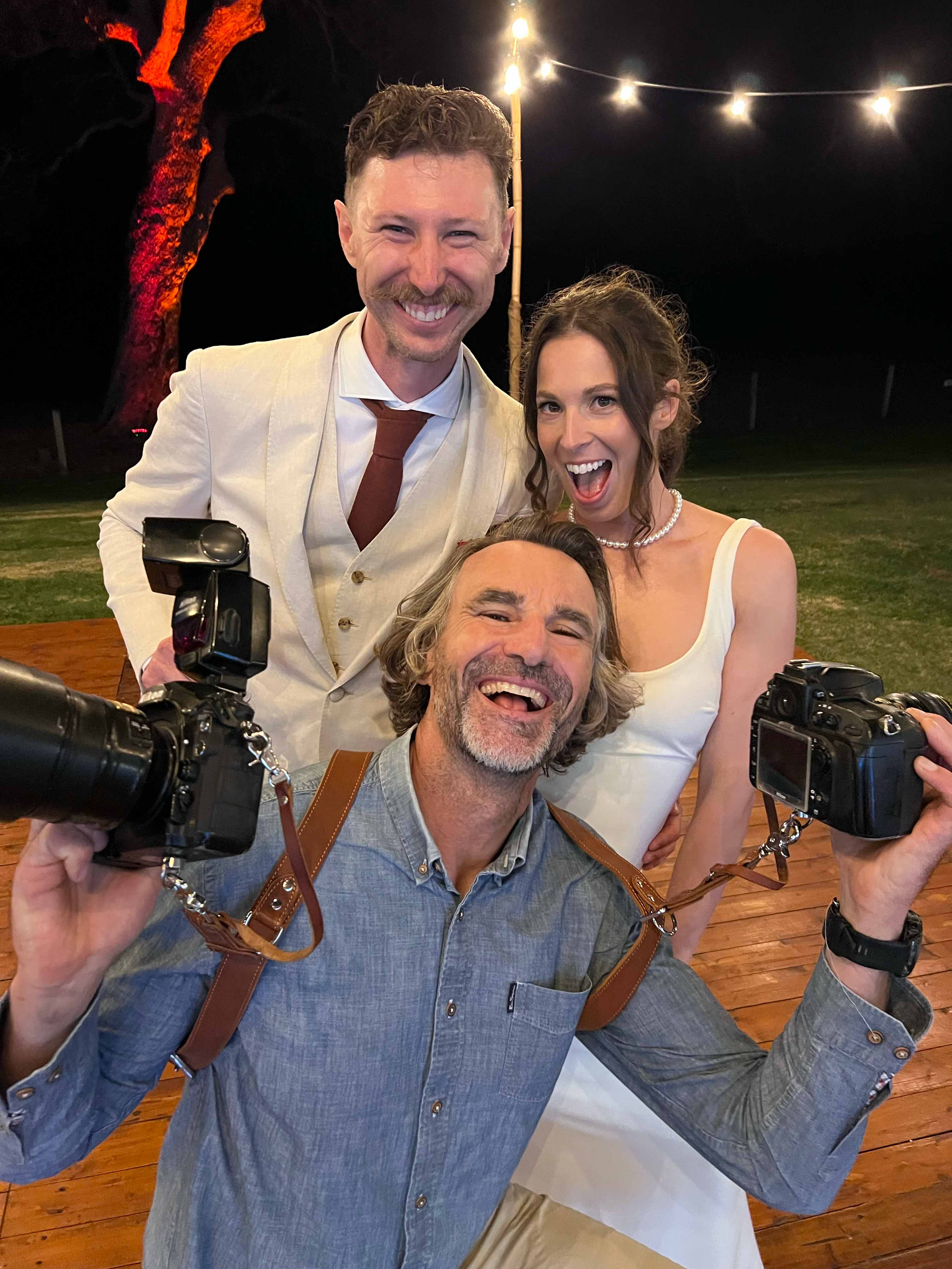 photographer John Rice with a couple at a Margaret River beach wedding
