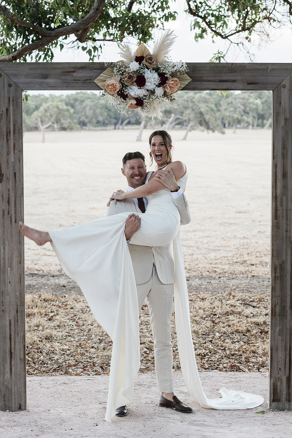 Margaret River elopement from interstate couple celebrating after ceremony South West WA photography by John Rice