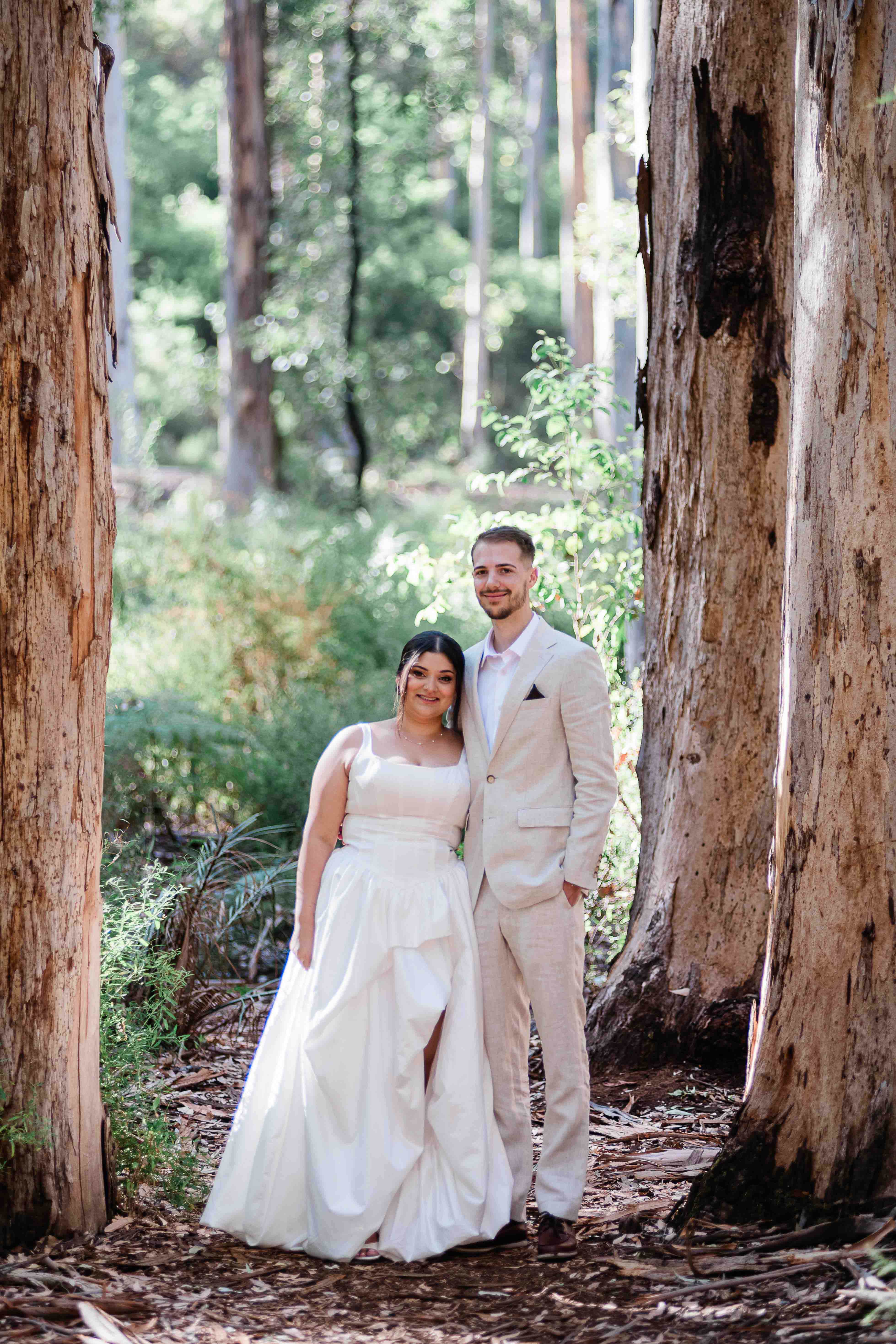 beautiful portrait bride and groom looking at camera boranup forest margaret river