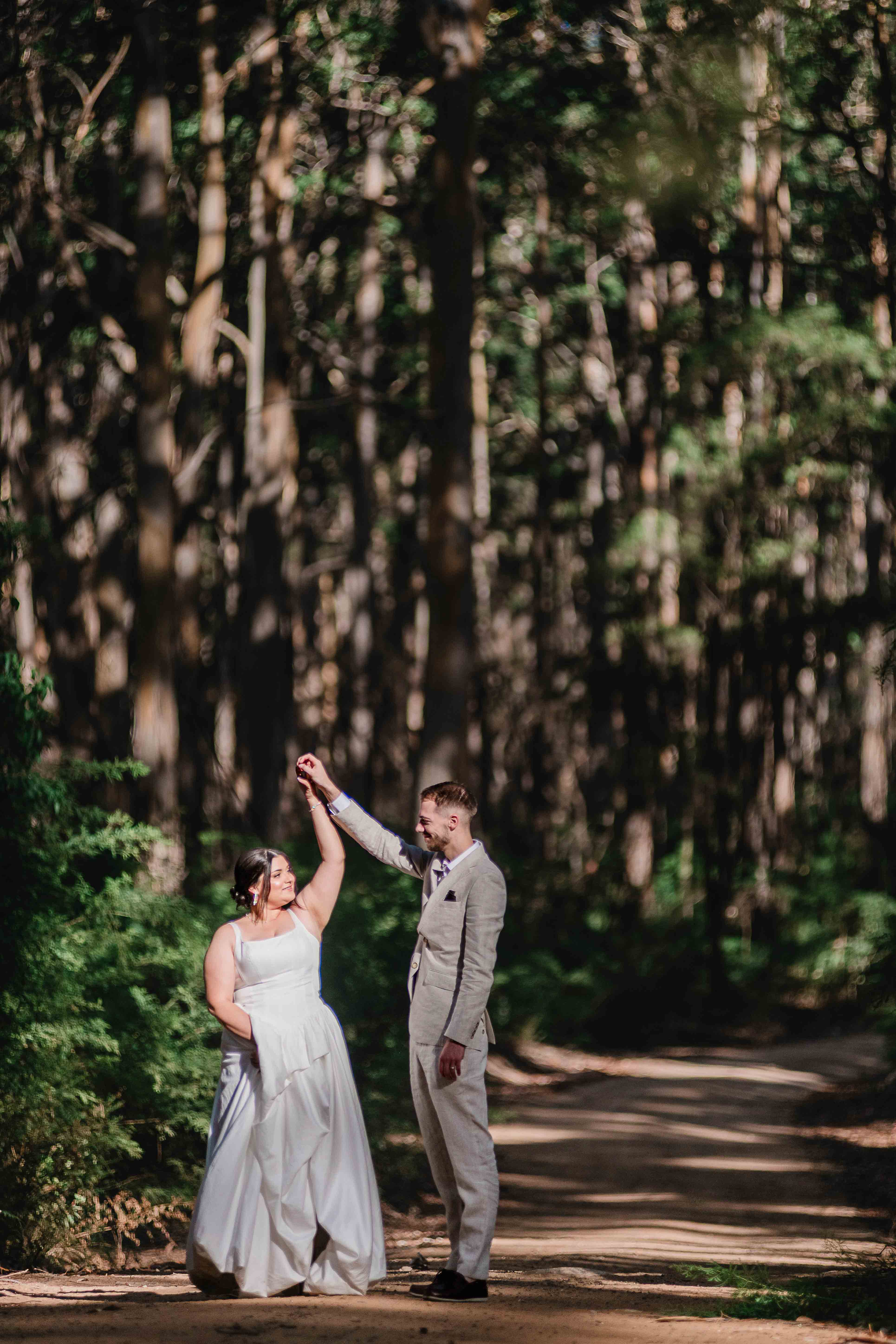 bride and groom dance bathed in beautiful light private boranup forest location