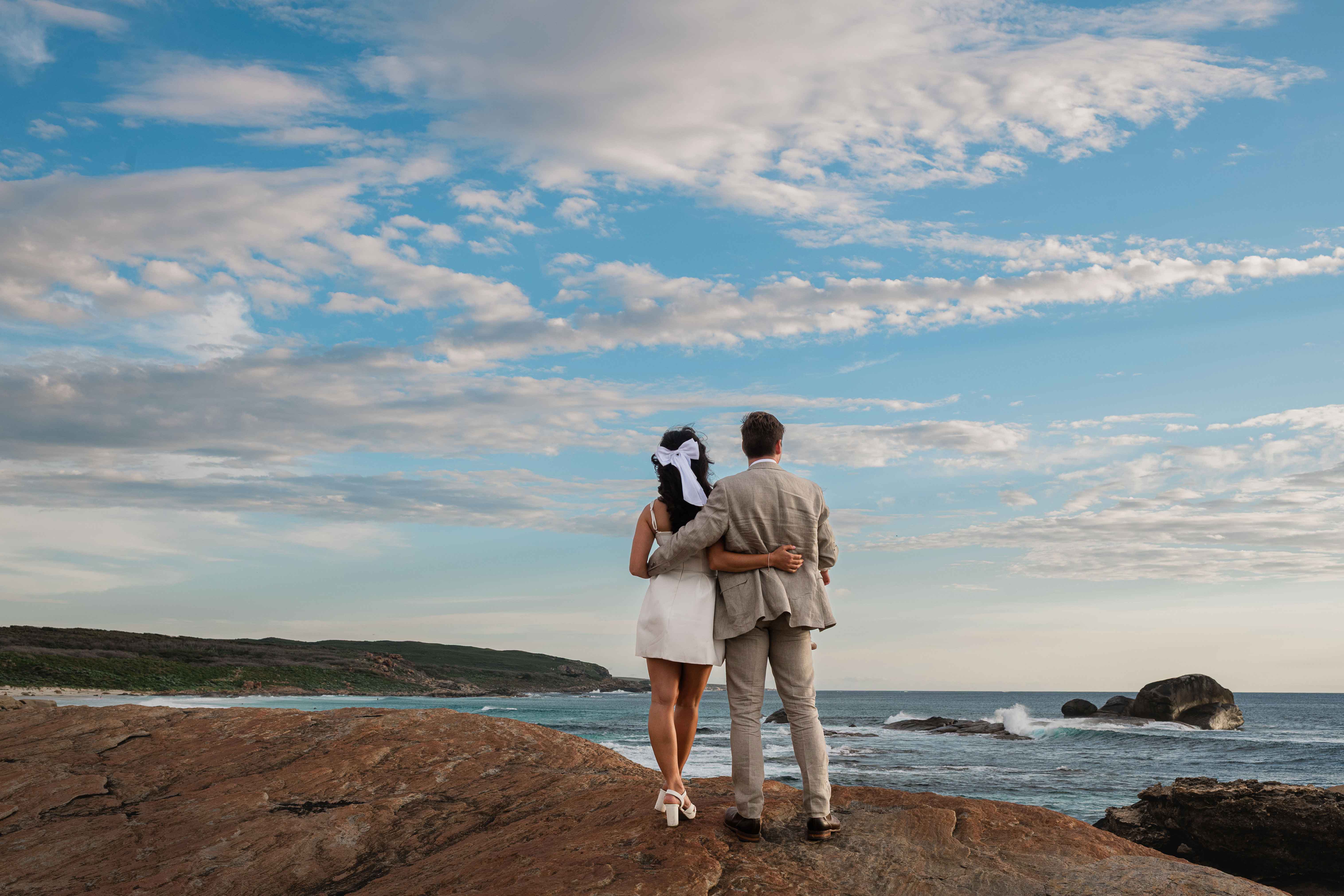 James and Sarah at a Margaret River coastal beach during golden hour after their Boranup elopement