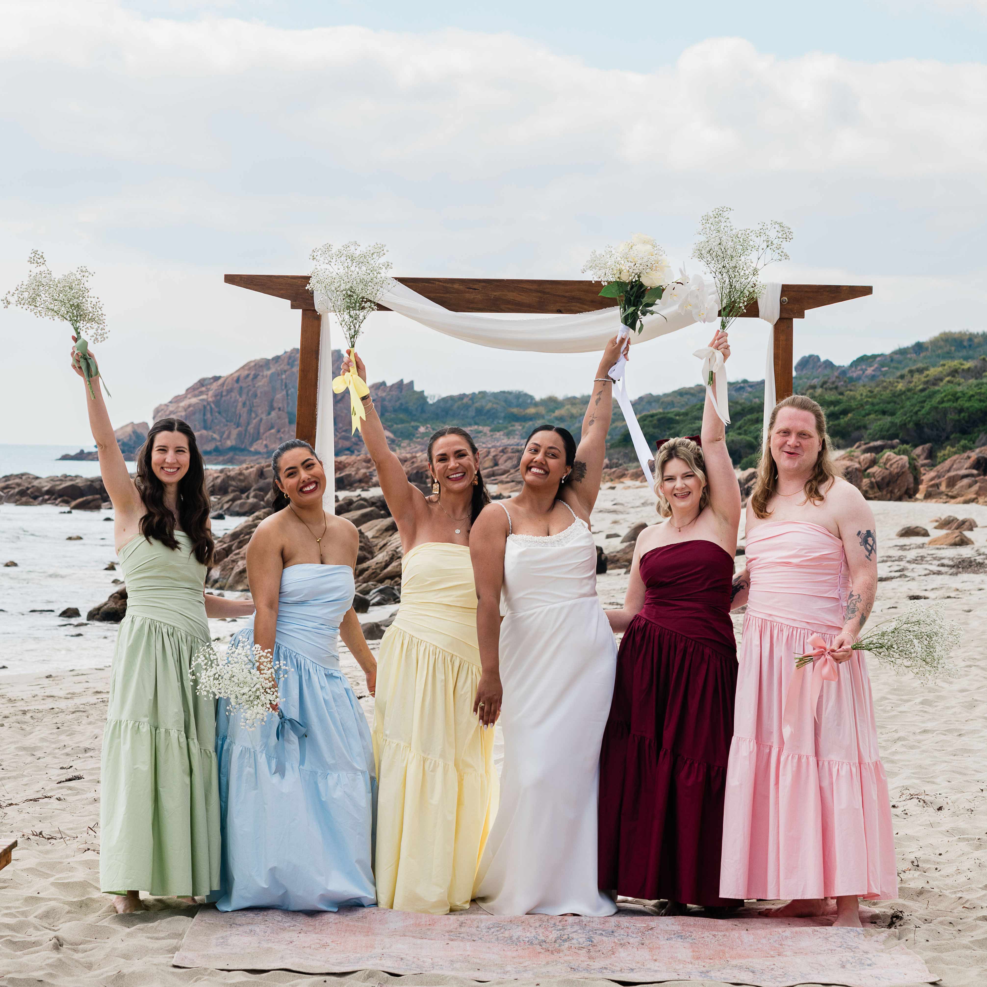 bridal party celebrating at a beach micro-wedding at Castle Rock, Dunsborough