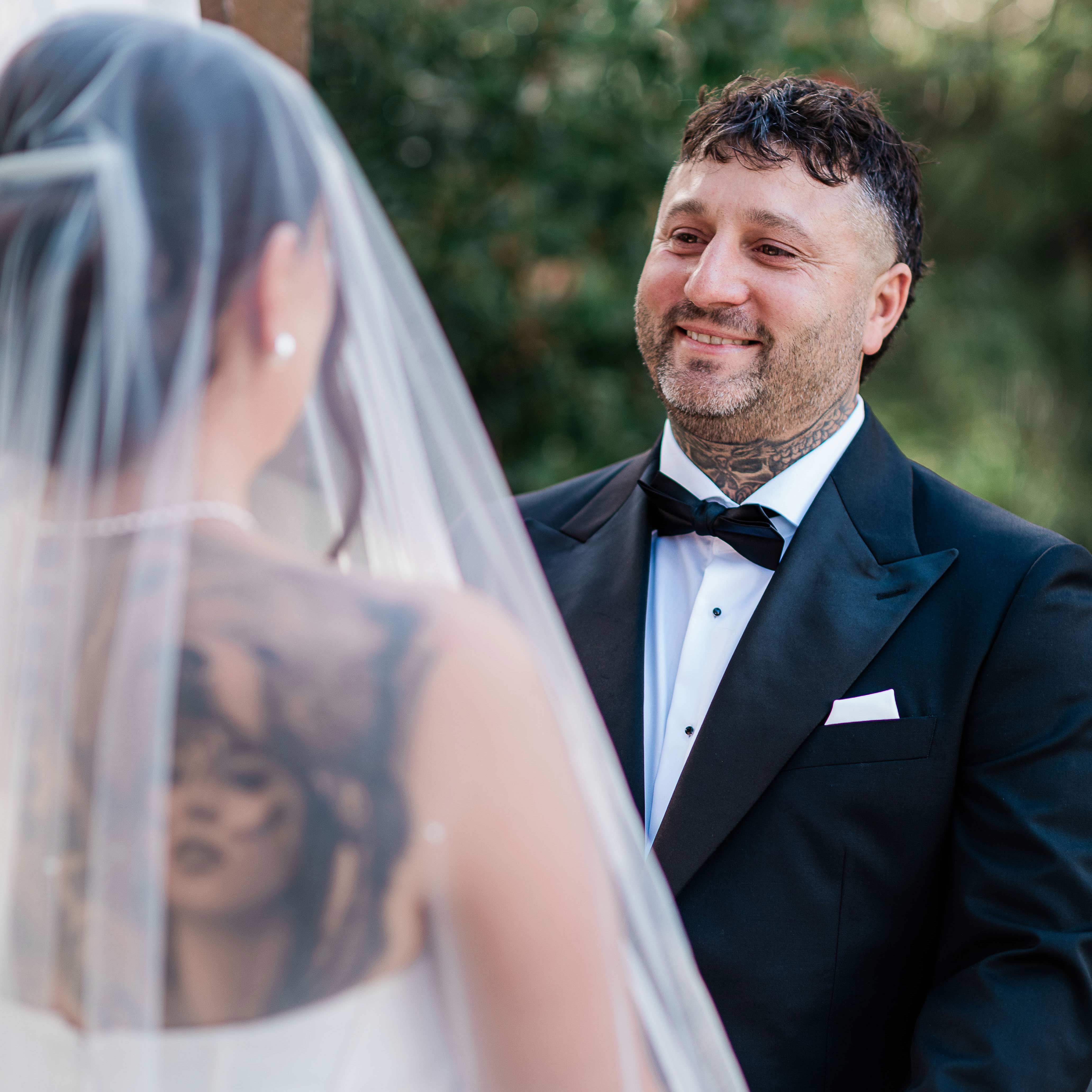 Bina Maya Yallingup Escape wedding first look, groom's loving gaze at bride through veil